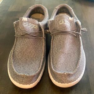 Men’s grey Hey Dudes slip ons
